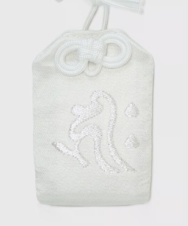 Solid white omamori pouch with the large, silver embroidered Japanese character "飛" (tobi or hi, meaning "fly" or "jump").