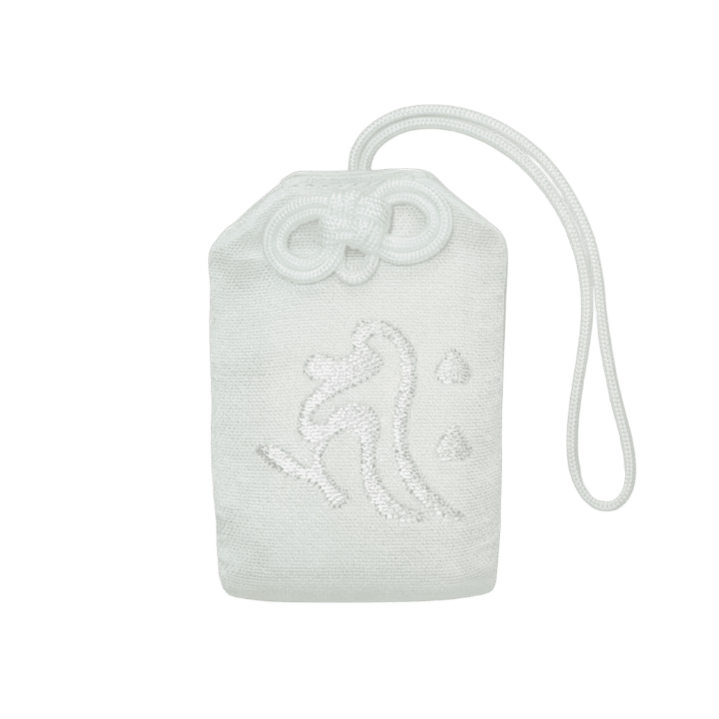 White Omamori for business prosperity with gold embroidery of Kanji text and coins/symbols, featuring a bright yellow rope knot.