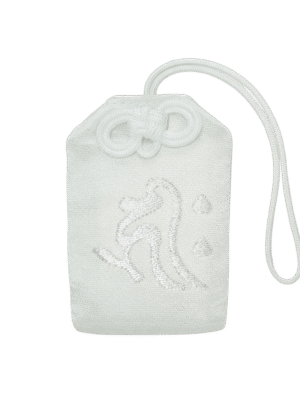 White Omamori for business prosperity with gold embroidery of Kanji text and coins/symbols, featuring a bright yellow rope knot.